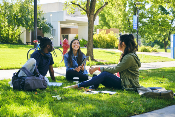 Students talking on campus quad.